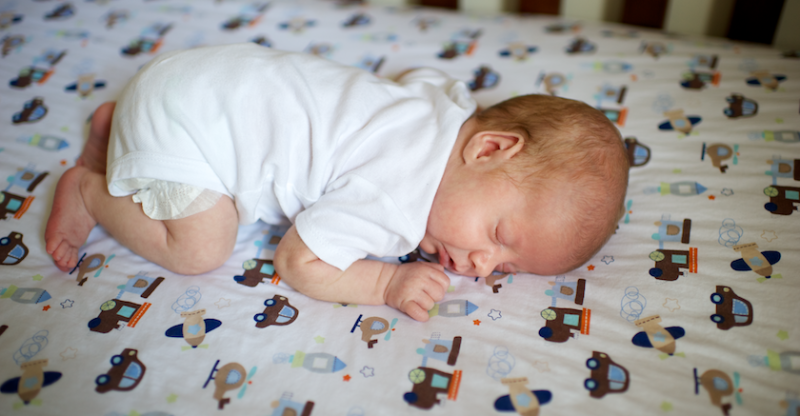 baby sleeping on tummy